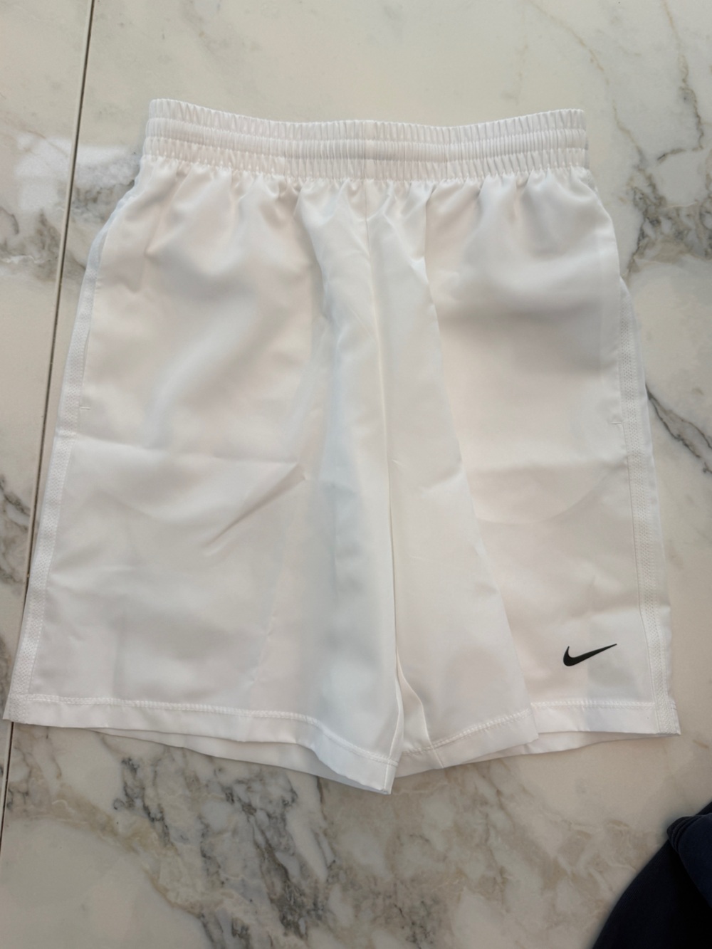 Nike White Kids Athletic Shorts with Black Swoosh